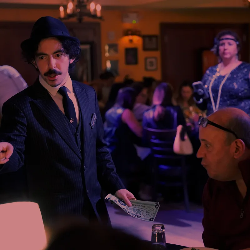 A detective questioning a guest at a Detroit show